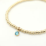 December - Blue Topaz Birthstone Gold Beaded Bracelet